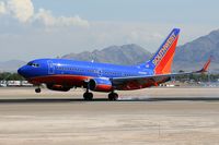 N244WN @ LAS - Southwest Airlines N244WN (FLT SWA2219) from John Wayne Orange County (KSNA) touching down on RWY 25L.