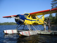 CF-IPL - Atikokan Aero's  DHC-2 at Canadian Customs on Saganaga Lake, Ontario - by Laura Marxen