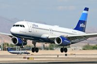N528JB @ LAS - Jet Blue N528JB Mi Corazon Azul (FLT JBU194) from Long Beach (KLGB) nearing touchdown on RWY 25L.