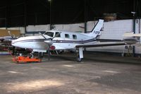 F-GPBF @ EGTR - PA-31T Navajo in the hangar at Elstree