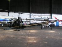 N38763 @ EGTR - Hiller UH-12 in the hangar at Elstree