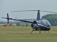 G-DGOD @ EGBP - Robinson R22 Beta - by Robert Beaver