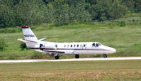 N393QS @ PDK - LANDING 20L - Air Brakes Extended - by Michael Martin