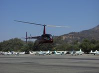 N435DE @ SZP - 2005 Robinson R44 RAVEN II, Lycoming IO-540 derated to 245 Hp for takeoff 205 Hp continuous, takeoff turn - by Doug Robertson