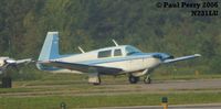 N231LU @ PVG - Pretty blue parked Mooney - by Paul Perry