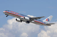 N7667A @ LAX - American Airlines N7667A climbing out from RWY 25R. - by Dean Heald