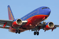 N246LV @ LAX - Southwest Airlines N246LV on final approach to RWY 24R. This aircraft was delivered to Southwest on July 6, 2006.