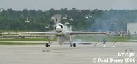 LY-LJK @ NCA - Taxiing back after his ribbon cut (note port wingtip), he clears some seagulls as well