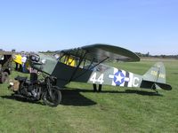 G-AJES @ EGBT - Piper Cub with vintage motorcycle at Turweston