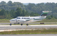 N184D @ PDK - Landing Runway 2R - by Michael Martin