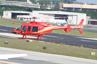 N427TJ @ PDK - Landing at Epps Air Service - by Michael Martin