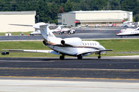N701LX @ PDK - Taxing to Runway 20L - by Michael Martin
