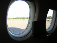 N269QS @ KBLM - looking out the window while taxing - by William Hughes