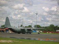 5142 @ SYCJ - C-130 on ramp at Georgetown Guyana - by John J. Boling