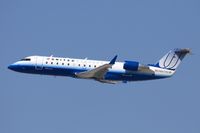 N979SW @ LAX - United Express (operated by SkyWest Airlines) N979SW (FLT SKW6522) on a shallow climb out from RWY 25R enroute to Phoenix Sky Harbor Int'l (KPHX).