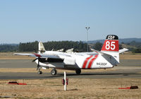 N438DF @ STS - Santa Rosa-based CDF S-2T Tanker #85 with relief pilot Bill Buckley at the controls leaving the Sonoma County Airport, CA air attack base with load of retardent - by Steve Nation