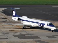 SP-LGM @ EPWA - Lot - Embraer 145 - by Artur Bado?
