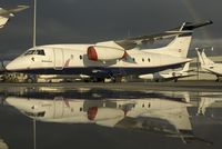 OE-HTG @ VIE - Grossmann Air Service Dornier 328 - reflection - by Yakfreak - VAP