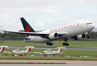 C-GAVC @ EGCC - Air Can's 767 lifting off 24R. - by Kevin Murphy