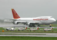 TF-AME @ EGCC - Travel City 747 leaving in the rain. - by Kevin Murphy