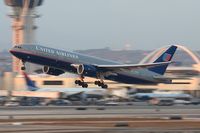 N787UA @ LAX - United Airlines N787UA (FLT UAL934) departing RWY 25R enroute to London Heathrow (EGLL) a few minutes before sunset.