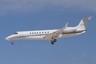 N905LX @ LAS - Embraer Legacy on finals at Las Vegas - by George Hobbs