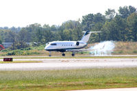 N710GA @ PDK - Smoking tires on landing. - by Michael Martin