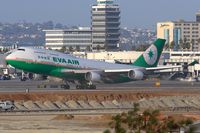 B-16411 @ LAX - EVA Air B-16411 (FLT EVA11) departing RWY 25R enroute to Chiang Kai Shek Int'l (RCTP). [Canon 30D, Canon 300mm f/2.8L IS]