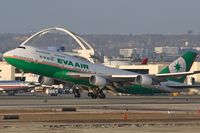 B-16411 @ LAX - EVA Air B-16411 (FLT EVA11) departing RWY 25R enroute to Chiang Kai Shek Int'l (RCTP). [Canon 30D, Canon 300mm f/2.8L IS]