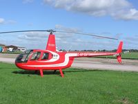 G-RMBM @ EGBT - Robinson R44 in new colours at Turweston - by Simon Palmer