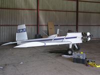 G-BMJM @ EGBK - Evans VP-1 in hangar at Sywell before being dismantled