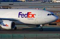 N423FE @ LAX - Fed Ex N423FE turning onto Taxiway Alpha after arrival from Phoenix Sky Harbor Int'l (KPHX) as FLT FDX3863. - by Dean Heald
