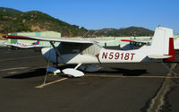 N5918T @ DVO - Straight-tailed 1964 Cessna 150D with cabin cover @ Gnoss Field (Novato), CA - by Steve Nation