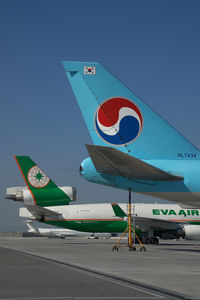 HL7434 @ VIE - Eva Air MD11 with Korean Air Boeing 747-400 - by Yakfreak - VAP