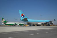 HL7434 @ VIE - Eva Air MD11 with Korean Air Boeing 747-400 - by Yakfreak - VAP