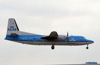 PH-LXP @ AMS - Fokker 50  KLM Cityhopper - by Mark Giddens
