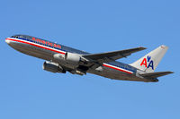 N332AA @ LAX - American Airlines N332AA (FLT AAL22) climbing out from RWY 25R enroute to John F Kennedy Iny'l (KJFK). - by Dean Heald
