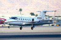 N797TA @ LAS - Flight Options Raytheon Beechjet 400A N797TA (FLT OPT797) from Fresno Yosemite Int'l (KFAT), nearing touchdown on RWY 25L.