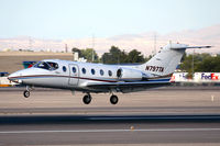 N797TA @ LAS - Flight Options Raytheon Beechjet 400A N797TA (FLT OPT797) from Fresno Yosemite Int'l (KFAT), nearing touchdown on RWY 25L.