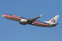N903AN @ LAX - American Airlines N903AN (FLT AAL2452) climbing out from RWY 25R enroute to Dallas Fort Worth Int'l (KDFW).  Note the winglets on this 737-800. - by Dean Heald
