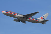 N325AA @ LAX - American Airlines N325AA (FLT AAL22) climbing out from RWY 25R enroute to John F Kennedy Int'l (KJFK). - by Dean Heald