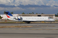 N710BR @ LGB - SkyWest Airlines N710BR (FLT SKW03E) on RWY 12 after arrival from Salt Lake City Int'l (KSLC).