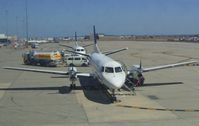 VH-KDB - KDB waiting for passengers while Saab 340B VH-RXN is behind. - by PcorF