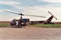 N841M - Combat vet, once gunship now cropduster near Malta, IL - by Glenn E. Chatfield