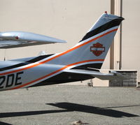 N182DE @ SAC - Harley-Davidson Motorcycles tail logo on Sacramento Aviation Management 1985 Cessna 182R @ Sacramento Executive Airport, CA - by Steve Nation