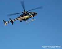 N575NE - on patrol over GI during pres. Bush visit - by kevin vince osborn