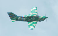 N4023B @ BEQUIA - P-40 curtis paint - by Arthur Kent