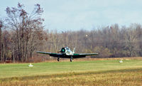 N29678 @ D51 - Yes, you can still fly a T-6 from a small, wet grass strip just north of Buffalo in November