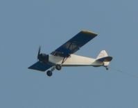 N3842Z - Some people are more attracted to the airplane than to the banner! - by Daniel L. Berek