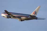 N325AA @ LAX - American Airlines N325AA (FLT AAL242) climbing out from RWY 25R enroute to John F Kennedy Int'l (KJFK). - by Dean Heald